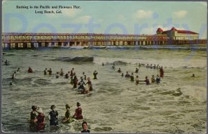 BATHING IN THE PACIFIC AND PLEASURE PIER  LONG BEACH CALIFORNIA