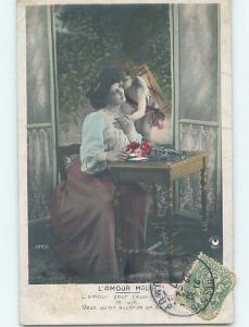 1907 rppc Valentine CUPID KISSES PRETTY WOMAN ON THE CHEEK HM1230