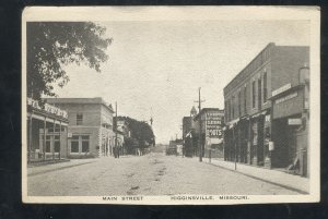 HIGGINSVILLE MISSOURI DOWNTOWN MAIN STREET SCENE STORES VINTAGE POSTCARD MO.