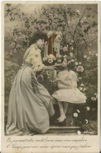 Beautiful French Woman expressing Love to pretty Little Girl or Daughter