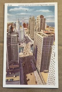 VINTAGE .01 POSTCARD UNUSED - LOOKING NORTH ON MICHIGAN BLVD., CHICAGO, ILL.