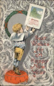 New Year Little Boy Hangs Calendar c1910 Vintage Postcard