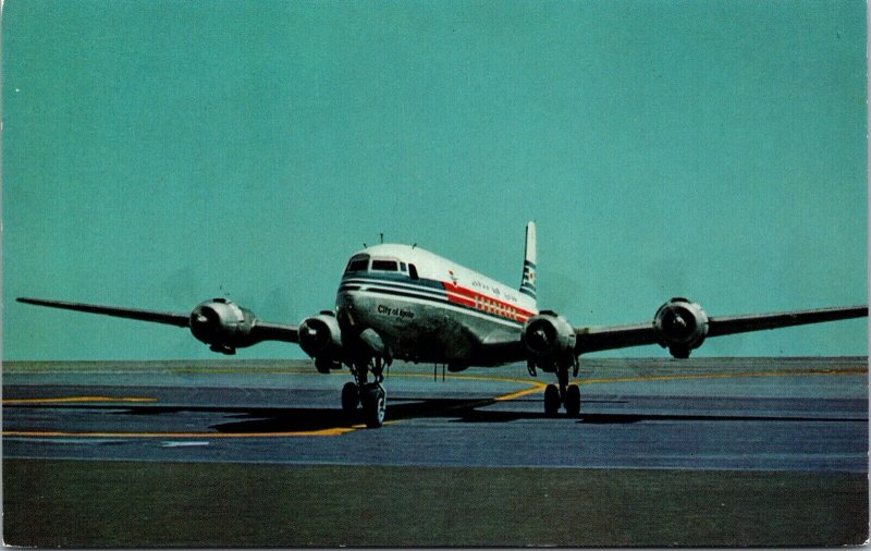 PC Japan Airlines Sleek DC-6B Pacific Courier Tokyo International Airport~133819 