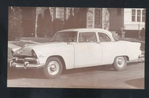 1955 PLYMOUTH PLAZA 2 DOOR SEDAN VINTAGE CAR DEALER ADVERTISING POSTCARD