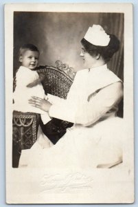 c1910's Nurse And Baby On Chair Studio St. Paul MN RPPC Photo Posted Postcard