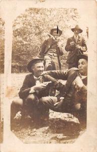 Men in Woods Holding Gun Real Photo Antique Postcard J67660