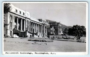 RPPC WELLINGTON, NZ New Zealand ~ PARLIAMENT BUILDINGS  1956 Car   Postcard