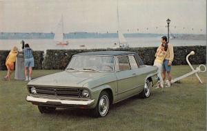 Studebaker Daytona Sport Sedan sailboats in background vintage pc Z19747