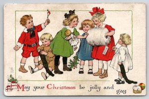 Christmas Joy Children with Stockings And Gifts Tuck Series 543 Postcard U26