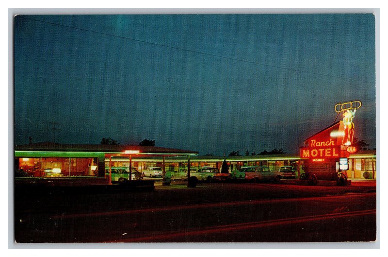 Postcard KS Ranch Motel Liberal Kansas Night Scene Old Cars Neon Sign 