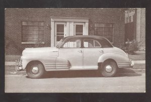 1948 CHEVROLET FLOOTMASTER SEDAN VINTAGE CAR DEALER ADVERTISING POSTCARD