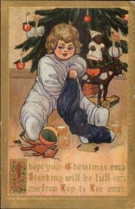 Christmas - Child in Jammies Toys Stocking Tree Marion Miller c1910 Postcard