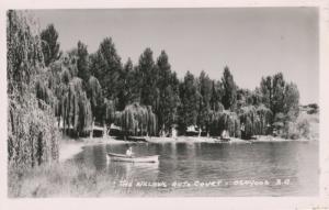The Willows Auto Court Osoyoos BC Lake Man In Boat Real PhotoPostcard E6