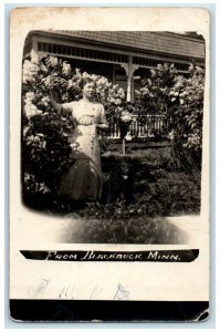 c1910's Woman Picking Flowers From Blackduck Minnesota MN RPPC Photo Postcard