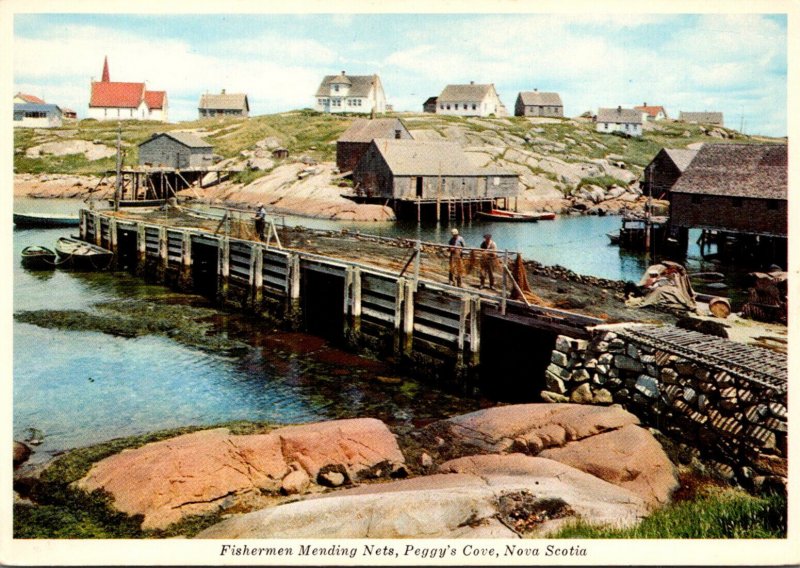 Canada Nova Scotia Peggy's Cove Fishermen Mending Nets