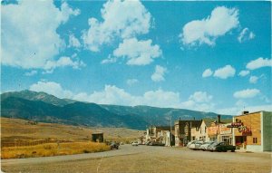 Montana Gardiner Main Street automobiles 1950s Seaich Postcard 22-3868