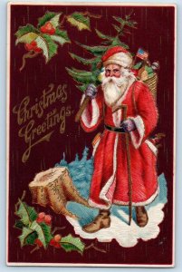 Christmas Postcard Greetings Santa Claus With Toys Basket Holly Berries Embossed