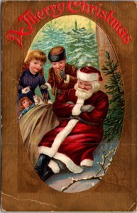 Christmas Postcard Children Sneaking Up on Sleeping Santa Claus Bag of Toys