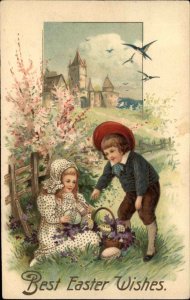 Easter Egg Hunt Little Boy and Girl Embossed c1910 Vintage Postcard