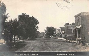 RPPC SCENE ON MAIN STREET ALEXANDRIA NEBRASKA REAL PHOTO POSTCARD 1909