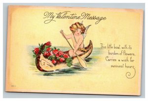 Vintage 1910's Valentines Postcard - Cupid Rows a Canoe Full of Red Roses NICE