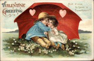Valentine Little Boy and Girl Cuddle Under Umbrella c1910 Postcard