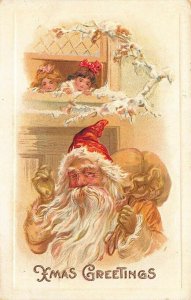 Christmas Greeting Brown Suited Santa Claus Two Girls Window Postcard