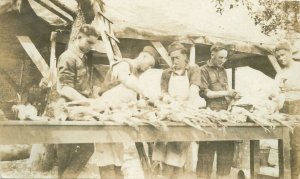 Postcard RPPC C-1918 WW2 Soldiers Plucking chickens 23-6487