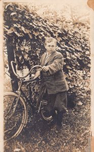 YOUNG STOCKY BOY WITH BICYCLE~1910s REAL PHOTO POSTCARD