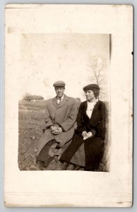 RPPC Handsome Man Trench Coat Lovely Young Woman in Field Postcard D26