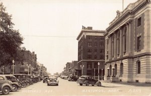 J74/ Hastings Nebraska RPPC Postcard c30-50s Street Scene Stores 394