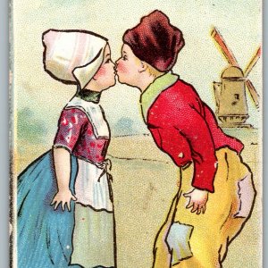 1909 Conrad's Coffee Calendar Bookmark Dutch Boy Girl Kissing Mailed Trade Card