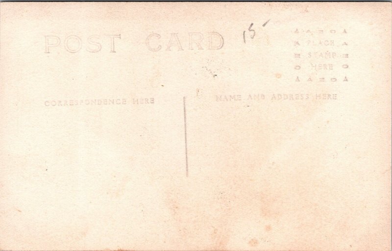 RPPC POSTCARD Cowboys Sheepskin Chaps Guns Studio c1910 JD19