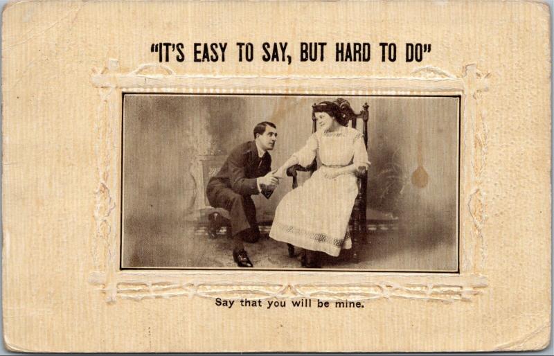 postcard Man on knee proposing to woman in chair - Easy to say, but hard to do