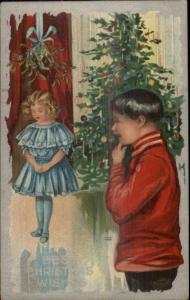 Christmas - Boy & Girl & Tree Silver Border c1910 Postcard