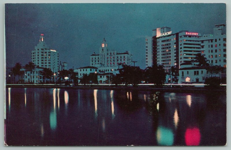 Miami FL~Looking Across Indian Creek View of Skyline At Night~Vintage Postcard