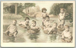 MULTIPLE BABIES BOATING in NUTSHELLS ANTIQUE REAL PHOTO POSTCARD RPPC