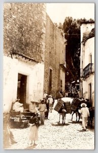 Mexico Busy Street Scene Donkeys Hauling Crates Taxco Real Photo Postcard C35