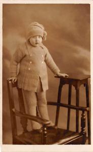 Young child standing in chair Child, People Photo Unused 