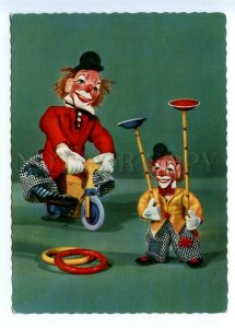 495608 East Germany GDR circus dolls clowns on a bicycle Old postcard