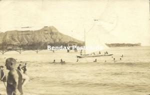 hawaii HONOLULU Oʻahu Waikiki Beach Scene with Boat and Pier 1919 RPPC