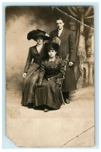 c1910 Two Victorian Women and Men in Hats Studio Portrait RPPC Photo Postcard