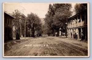 J87/ Romney West Virginia RPPC Postcard c1910 Main Street Hotel Stores 439