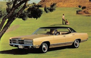 Automobile~Car Advertising   1969 FORD LTD 4-DOOR HARDTOP Gold & Black  Postcard