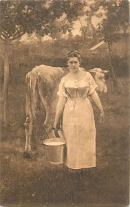 Manda Lametrie farmer cow milkmaid fine art painting old postcard Alfred Roll