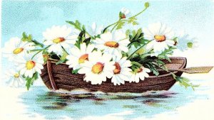 c1910 ALL GOOD WISHES ROW BOAT FULL OF DAISES ON LAKE POSTCARD 46-51