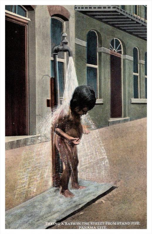 Panama Child taking bath in the street  from stand pipe