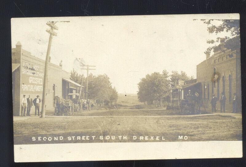 RPPC DREXEL MISSOURI DOWNTOWN SECOND STREET SCENE REAL PHOTO POSTCARD MO.