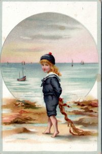 Trade Card - Woolson Spice -Girl in nautical outfit at beach