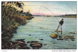 Man on rock of river Salmon fishng in Sweden, 00-10s